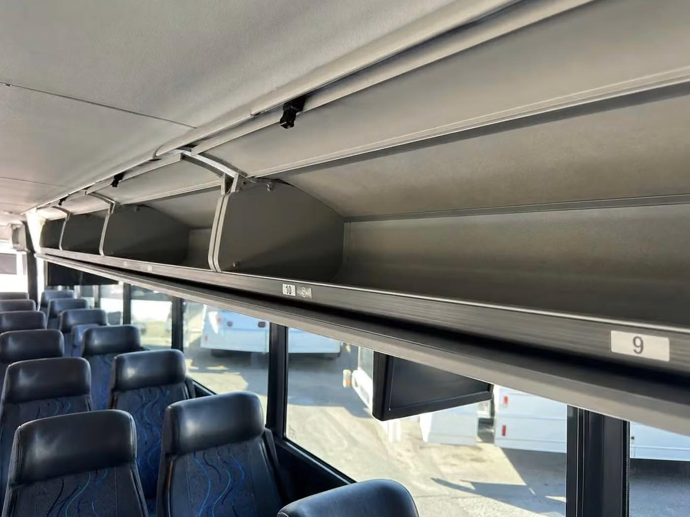 jeffersonville 28 passenger minibus overhead storage