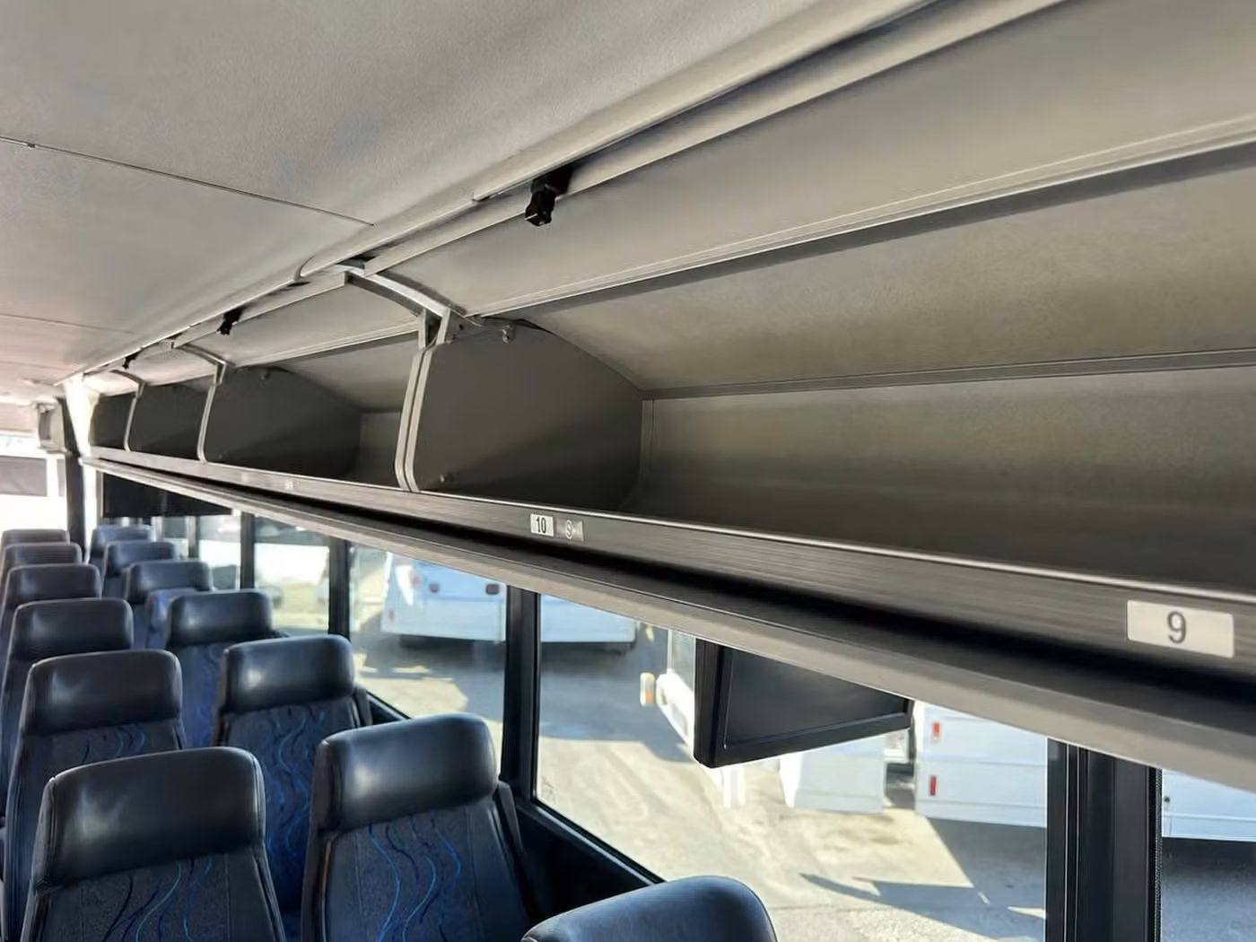 jeffersonville 56 passenger charter bus overhead storage